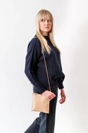 B. May Strappy Pouch